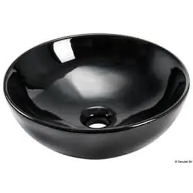 Semi-spherical ceramic sink for countertop installation.